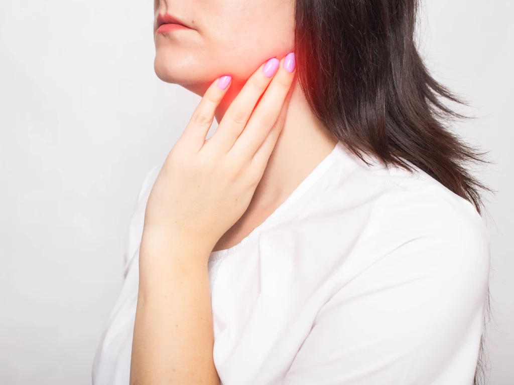 Neck swelling associated with a salivary gland tumour
